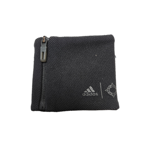 Black ribbed fabric zippered pouch with silver Adidas and Stella McCartney logos.