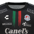 Black Atlético San Luis soccer jersey with central green and red brushstroke stripes, club crest, and various white sponsor logos like Canel's.