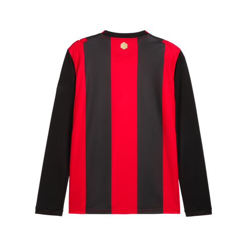 Back of a long-sleeved jersey with red and black vertical stripes on the torso and solid black sleeves. A small gold emblem is centered near the neckline.