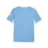 Back view of a light blue short-sleeved soccer jersey with white trim on the collar and sleeves. The word "CITY" is printed in small white letters below the neckline.