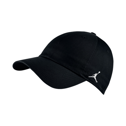 A black Jordan brand baseball cap with a small white Jumpman logo embroidered on the side, shown at an angle against a plain white background.