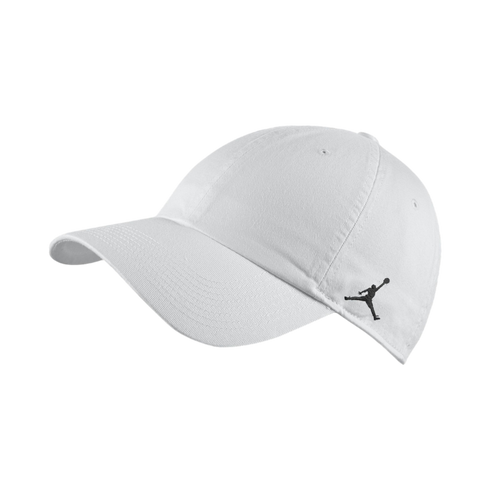 A white Jordan baseball cap with a small black Jumpman logo on the side, shown at a three-quarter angle.