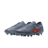 A pair of grey Nike Tiempo soccer cleats with a bright orange swoosh and blue-tinted studs, shown against a solid black background.