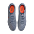 Top-down view of grey Nike Tiempo soccer cleats with bright orange interiors and grey laces, shown against a black background.