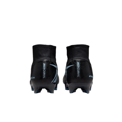 Rear view of black and light blue Nike Mercurial soccer cleats with high-top collars against a black background.