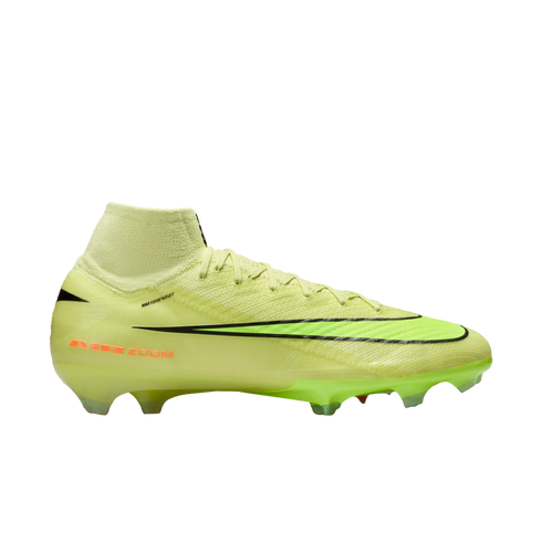 Side profile of a neon lime green Nike Mercurial Superfly soccer cleat with a black swoosh and orange branding on a solid black background.