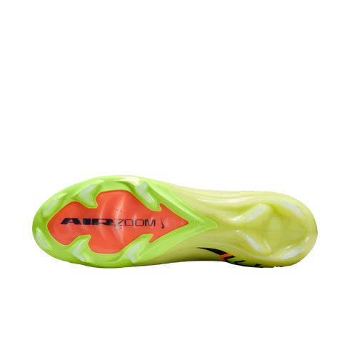 Bottom view of a lime green Nike soccer boot showing the orange forefoot plate with black "AIR ZOOM" text and translucent green studs.