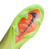 Underside of a lime green Nike soccer cleat with a bright orange 'Air Zoom' unit, black swoosh, and translucent studs.