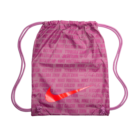 A pink Nike soccer drawstring bag with a large orange swoosh and the words "Nike soccer" in various languages printed in dark pink.