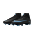 A pair of black Nike soccer cleats with light blue Swoosh logos and studs, set against a solid black background.