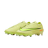 A pair of neon yellow Nike soccer cleats with a black swoosh and orange "AIR ZOOM" branding on the heel, set against a black background.