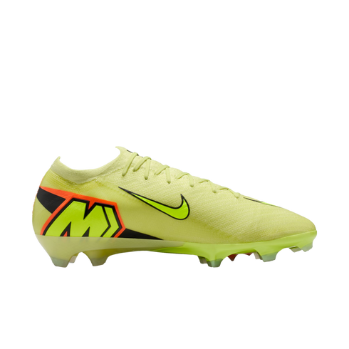 A bright yellow Nike soccer cleat with black and orange accents, featuring a large 'M' logo on the heel, shown against a solid black background.