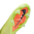 The sole of a neon yellow Nike football boot with translucent studs and an orange center plate featuring a black swoosh and "AIR ZOOM" text.
