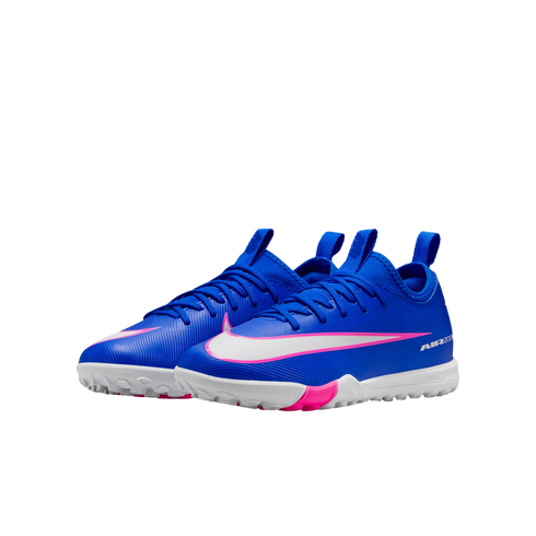 Pair of vibrant blue Nike Air Zoom turf soccer shoes featuring white swooshes with pink trim and a white textured outsole.