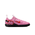 A side-view of a pink Nike Mercurial soccer shoe with a bright red Nike swoosh and a black sole, isolated on a black background.