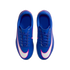Top-down view of bright blue Nike soccer cleats with white and pink swooshes on a solid black background.