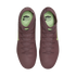 Top-down view of a pair of mauve Nike soccer cleats with neon green accents and "KM" branding on a black background.