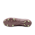 Sole of a dark maroon soccer cleat with lime green studs on a black background.