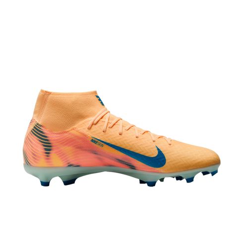 A bright orange Nike soccer cleat with a blue swoosh and high-top ankle collar, featuring a textured upper and blue studs against a solid black background.