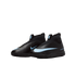 Pair of black Nike soccer turf cleats with light blue swoosh accents and high-top collars on a black background.