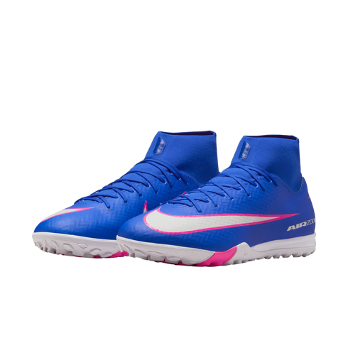 A pair of blue Nike Mercurial turf soccer shoes with a high-top collar, white swoosh outlined in pink, and textured outsoles, displayed against a black background.