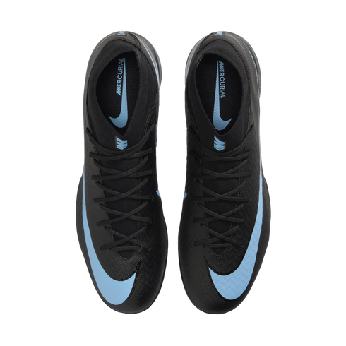 Top-down view of a pair of black Nike Mercurial soccer cleats with light blue swooshes and branding, set against a solid black background.