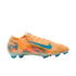 Side profile of an orange Nike soccer cleat with blue details and 'KM' logo on the heel, set against a black background.