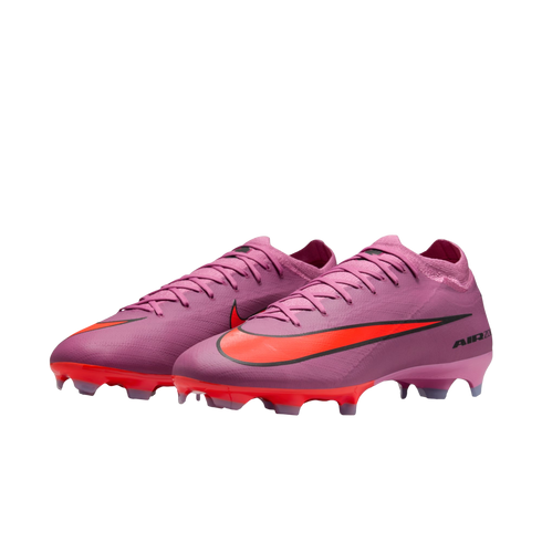 A pair of purple Nike Mercurial football boots with a red Nike swoosh and red sole plates, shown against a solid black background.