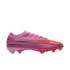 Profile view of a pink Nike Air Zoom Mercurial Vapor 15 soccer cleat featuring a bright orange Swoosh logo against a black background.