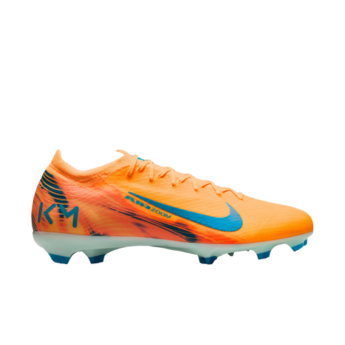 A Nike Mercurial Air Zoom KM soccer cleat in bright orange with blue accents and "KM" branding on the heel, shown in profile against a solid black background.