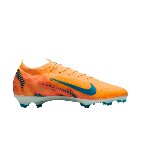 A bright orange Nike Flyknit soccer cleat featuring a teal blue swoosh and accents against a black background.