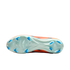 Bottom view of a Nike soccer cleat with a pale green soleplate and eleven blue bladed studs, showing a glimpse of the orange upper.