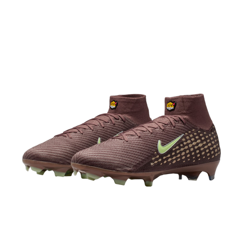 A pair of maroon Nike Mercurial Superfly football boots with pale green swooshes and high-top collars featuring KM AIR branding, shown against a black background.