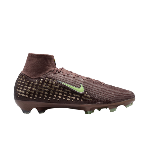 Side view of a maroon Nike high-top soccer cleat with a lime green Swoosh and golden textured heel patterns against a black background.