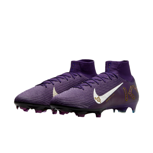 Pair of purple Nike soccer cleats with high collars, a white swoosh with gold accents, and gold KM branding on the heel.