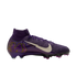 A purple Nike soccer cleat with a high-top ankle collar, a gold-patterned white swoosh, and the name "MBAPPÉ" on the heel.