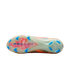 Bottom view of a Nike soccer cleat featuring a translucent soleplate with blue studs and "AIR ZOOM" branding on a black background.