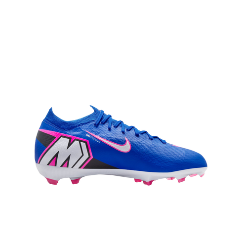 Blue Nike soccer cleat with pink and white accents, a large "M" logo on the heel, and pink studs against a black background.