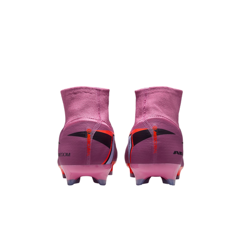Rear view of purple and red high-top Nike Mercurial soccer cleats with translucent soles, set against a black background.