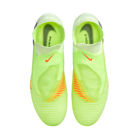 Top-down view of neon yellow Nike Phantom soccer cleats with orange accents and Nike swooshes, set against a solid black background.