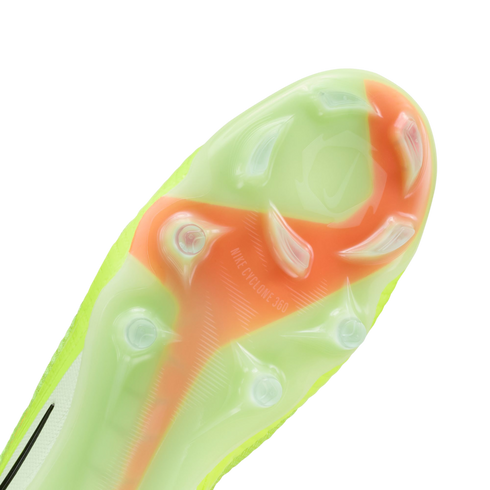 Close-up of a Nike football boot's lime green and orange soleplate, showing the translucent traction plate and "NIKE CYCLONE 360" stud pattern against a black background.