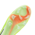 Close-up of a Nike football boot's lime green and orange soleplate, showing the translucent traction plate and "NIKE CYCLONE 360" stud pattern against a black background.