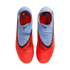 Top-down view of Nike Phantom soccer cleats featuring a vibrant red forefoot and light blue collar and laces on a black background.