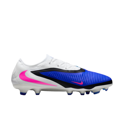 Side view of a white and blue Nike soccer cleat with pink accents and black trim on a black background.