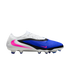 Side view of a white and blue Nike soccer cleat with pink accents and black trim on a black background.