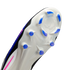 Close-up of the white soleplate of a Nike soccer cleat, featuring blue translucent studs and embossed "NIKE CYCLONE 360" text.
