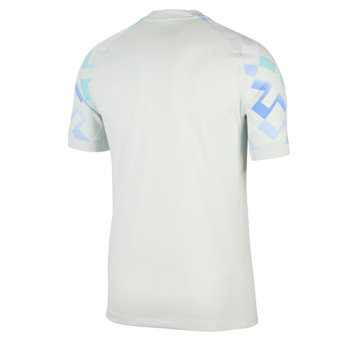 Back view of a white short-sleeved athletic shirt with blue and light blue geometric patterns on the sleeves.