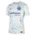 Inter Milan soccer jersey in light green with a blue pixelated geometric pattern, featuring the Nike swoosh, team crest, and betsson .sport sponsor logo.