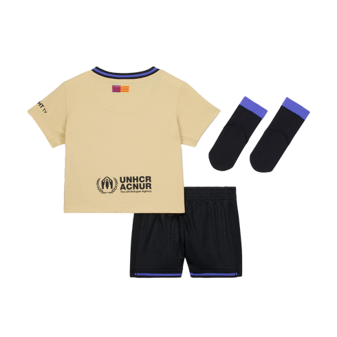 A tan t-shirt with the UNHCR logo on the back, black shorts with blue and purple trim, and matching black socks on a black background.
