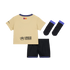 A tan t-shirt with the UNHCR logo on the back, black shorts with blue and purple trim, and matching black socks on a black background.